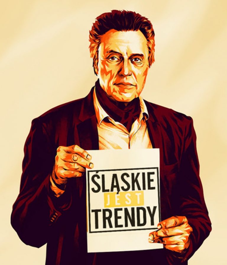 Człowiek trzymający tabliczkę z napisem: Śląskie jest trendy.